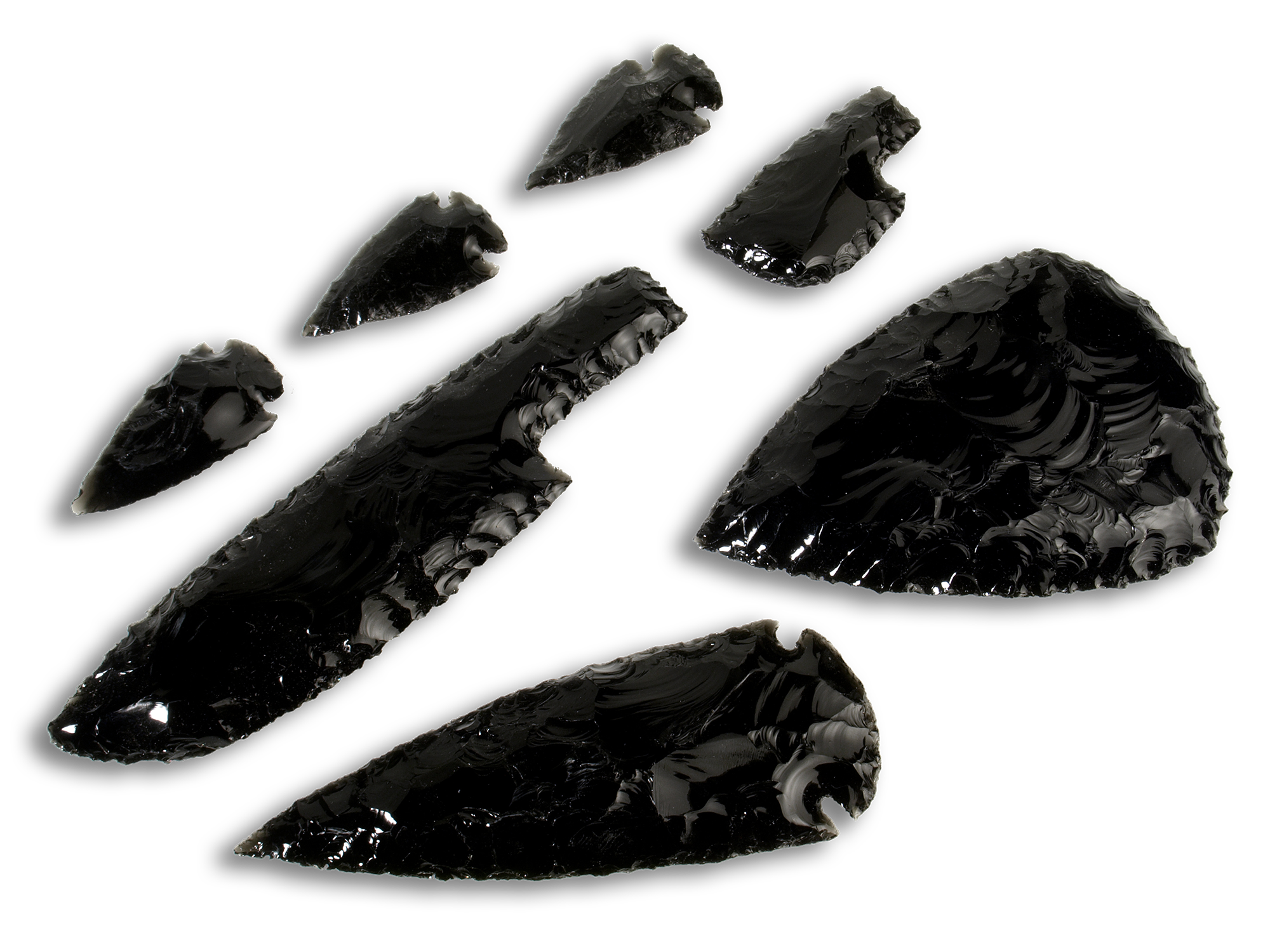 set of flint knapped black obsidian weapons